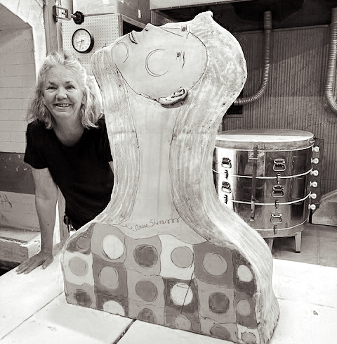 Sam Hodges poses with one of her pieces.